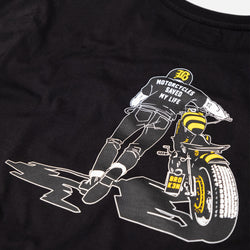 Black T-shirt with a graphic design of a person on a motorcycle back detail