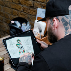 A black snapback baseball hat with 'Bike Shed Moto Co.' logo embroidered on the front.