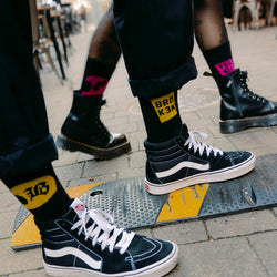 "BROK3N" Socks Yellow & Black on feet