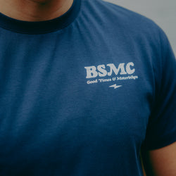 A navy-colored T-shirt with 'BIKE SHED MOTORCYCLE CO.' printed on the front.