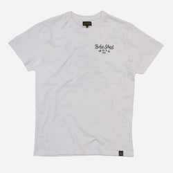 White t-shirt with dark green Bike Shed Moto Co logo text on a white background