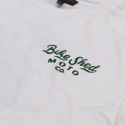 White shirt with 'Bike Shed Moto Co.' text in green on a white background