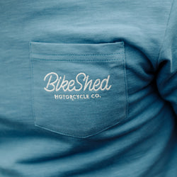 Bike Shed Motorcycle Co. Embroidered Pocket T Shirt - Blue, pocket & logo close up
