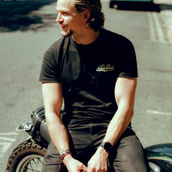Harry taking a rest while wearing BSMC Motorcycle Garage T Shirt - Black & Gold