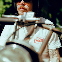 Close up of James wearing our Bike Shed Moto Co. Company T-Shirt - Off White