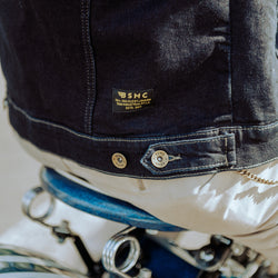 BSMC Denim Jacket - Resistant Indigo, small rear logo close up on John