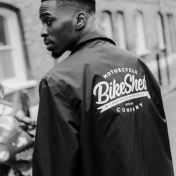 Model wearing BSMC Company Coach Jacket - Black