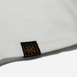 Hem tag close up of our Bike Shed Moto Co. Company T-Shirt - Off White