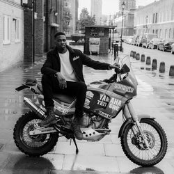 Model sitting on his Yamaha Tenere wearing our Embroidered Motorcycle Club Waffle Long Sleeve T-Shirt - Ecru