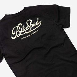 BSMC Motorcycle Garage T Shirt - Black & Gold, side on close up