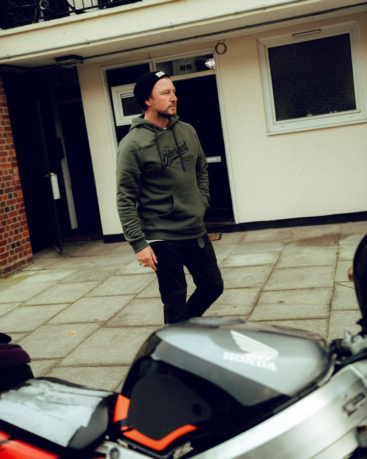 Donny wearing our BSMC Inc. Overhead Hoodie - Khaki Green