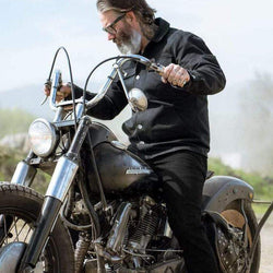 Model wearing our BSMC Resistant - BSR01 Jean - Black, sitting on his Harley