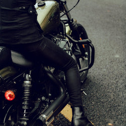 Clare on her Harley wearing our BSMC Resistant Women's Skinny Jean - Black
