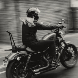 Clare wearing our Motorcycle Resistant Women's Skinny Jean - Black while riding her Harley