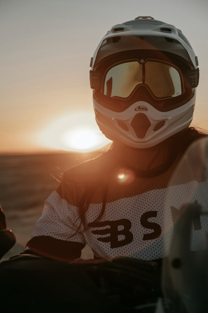 Caro wearing our Motorcycle Wing Race Jersey - Gold in the desert