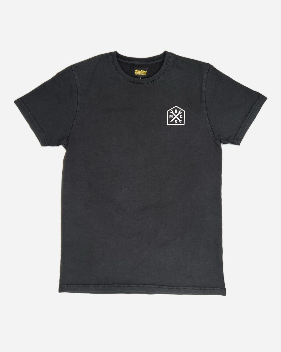 A washed black roundel t-shirt with a white graphic Bike Shed Moto Co. logo on the front. - front