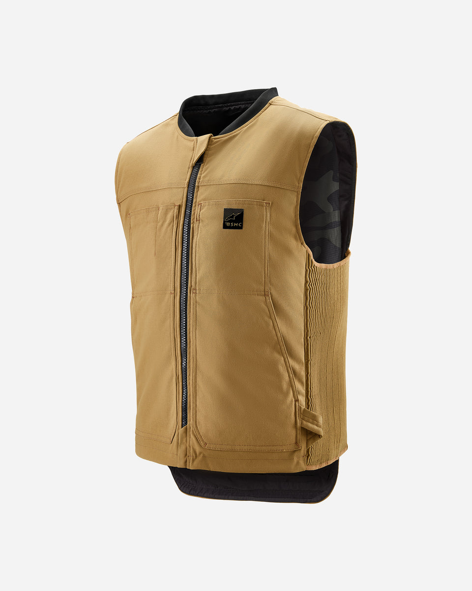 A tan Alpinestars Tech-Air 3 canvas airbag vest with a front zipper and logo on the chest.