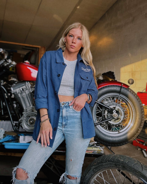 Brogan wearing our BSMC Chain Chore Jacket - Blue