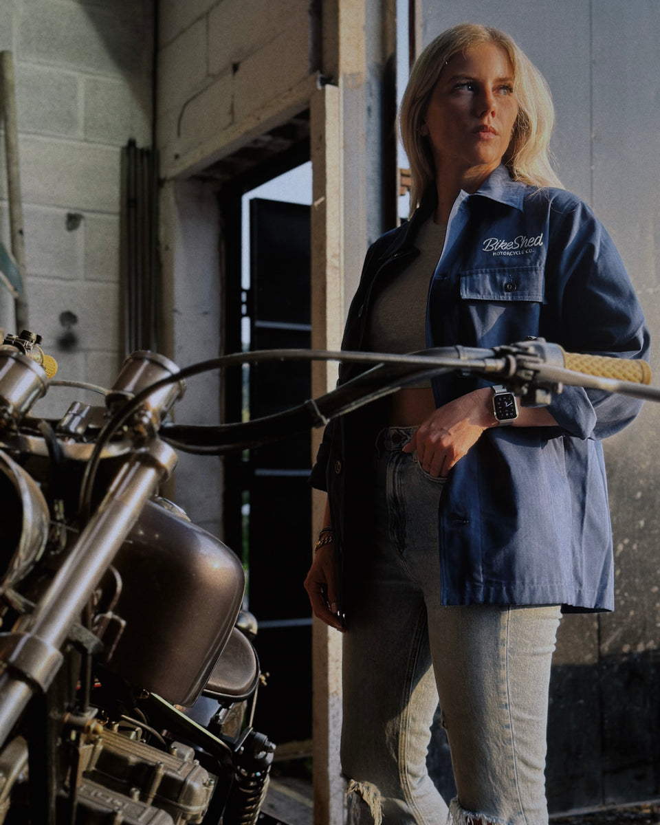 Brogan wearing our BSMC Chain Chore Jacket - Blue