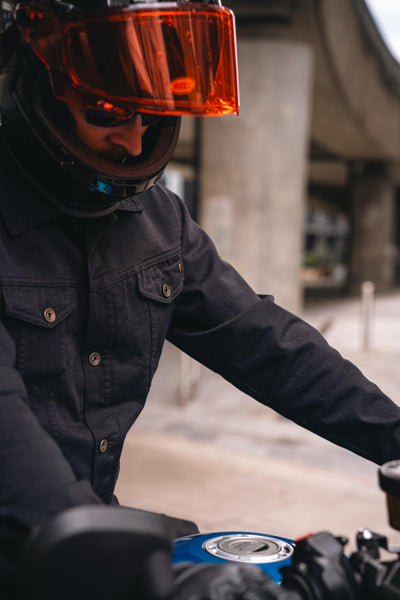 Gareth sitting on a Yamaha XSR wearing our Bike Shed Motorcycle Denim Jacket - Cordura Black