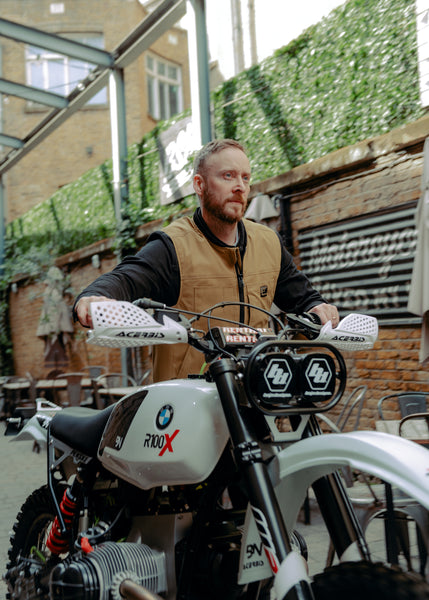 A tan Alpinestars Tech-Air 3 canvas airbag vest with a front zipper and logo on the chest.