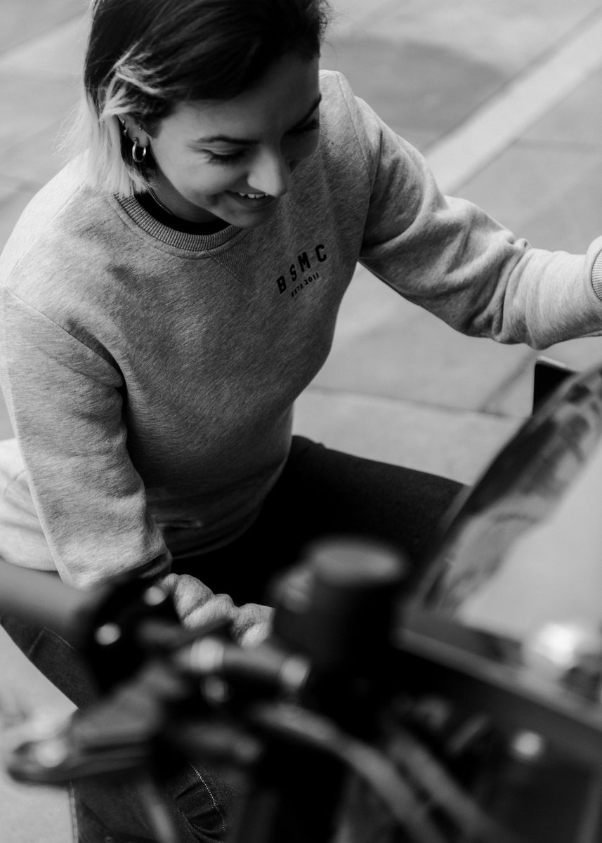 Kat wearing our Bike Shed Motorcycle Logo Sweatshirt - Grey Marl