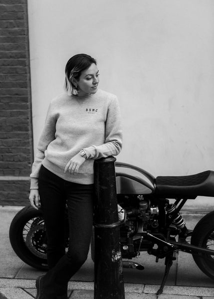 Kat wearing our Bike Shed Motorcycle Logo Sweatshirt - Grey Marl