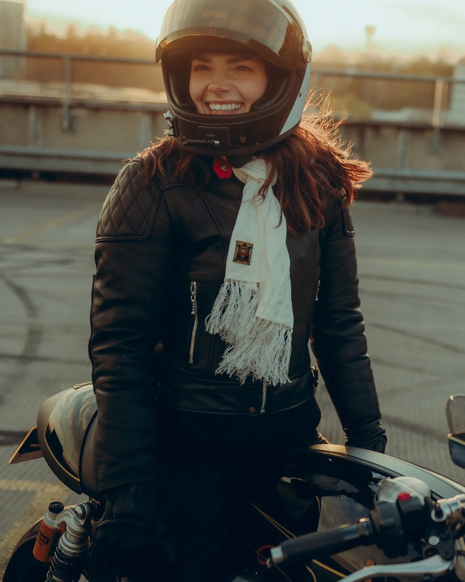 Goldtop Womens '76 Cafe Racer Jacket - Black worn by model on motorcycle 