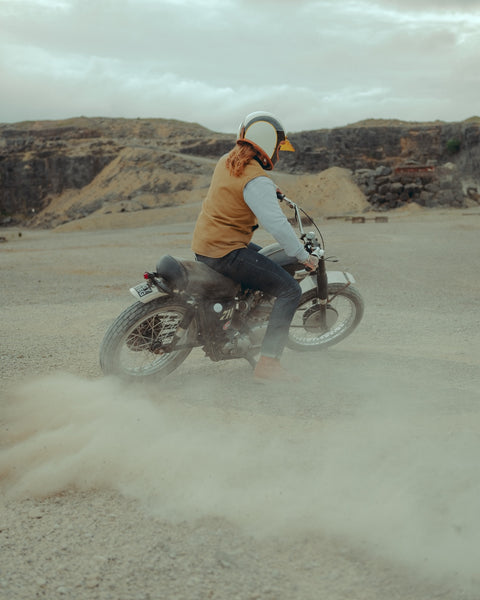 BSMC Utility Vest - Tan worn by a model riding a bike