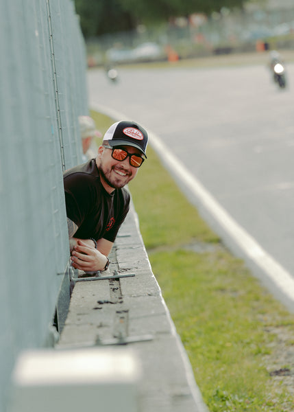Will smiling wearing our Bike Shed Logo Patch Baseball Hat  - Black/White