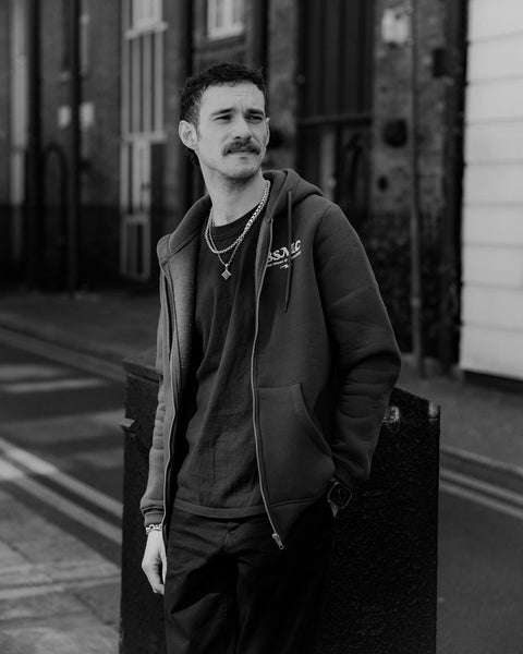 Green hoodie with 'Bike Shed Motorcycle Co.' embroidered on the front