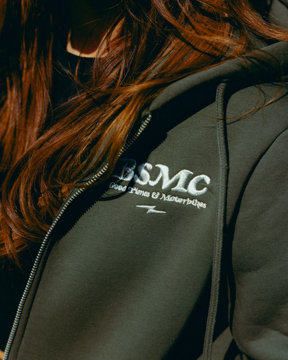 Green hoodie with 'Bike Shed Motorcycle Co.' embroidered on the front detail