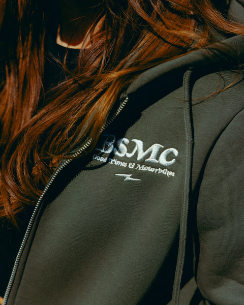 Green hoodie with 'Bike Shed Motorcycle Co.' embroidered on the front detail