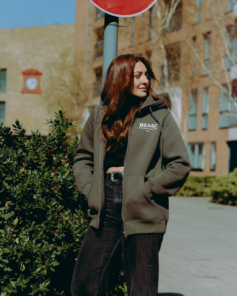 Green hoodie with 'Bike Shed Motorcycle Co.' embroidered on the front