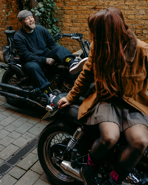 Liam wearing "BROK3N" Socks Yellow and black