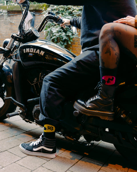 "BROK3N" Socks Yellow & black on feet