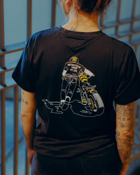 Black T-shirt with a graphic design of a person on a motorcycle back