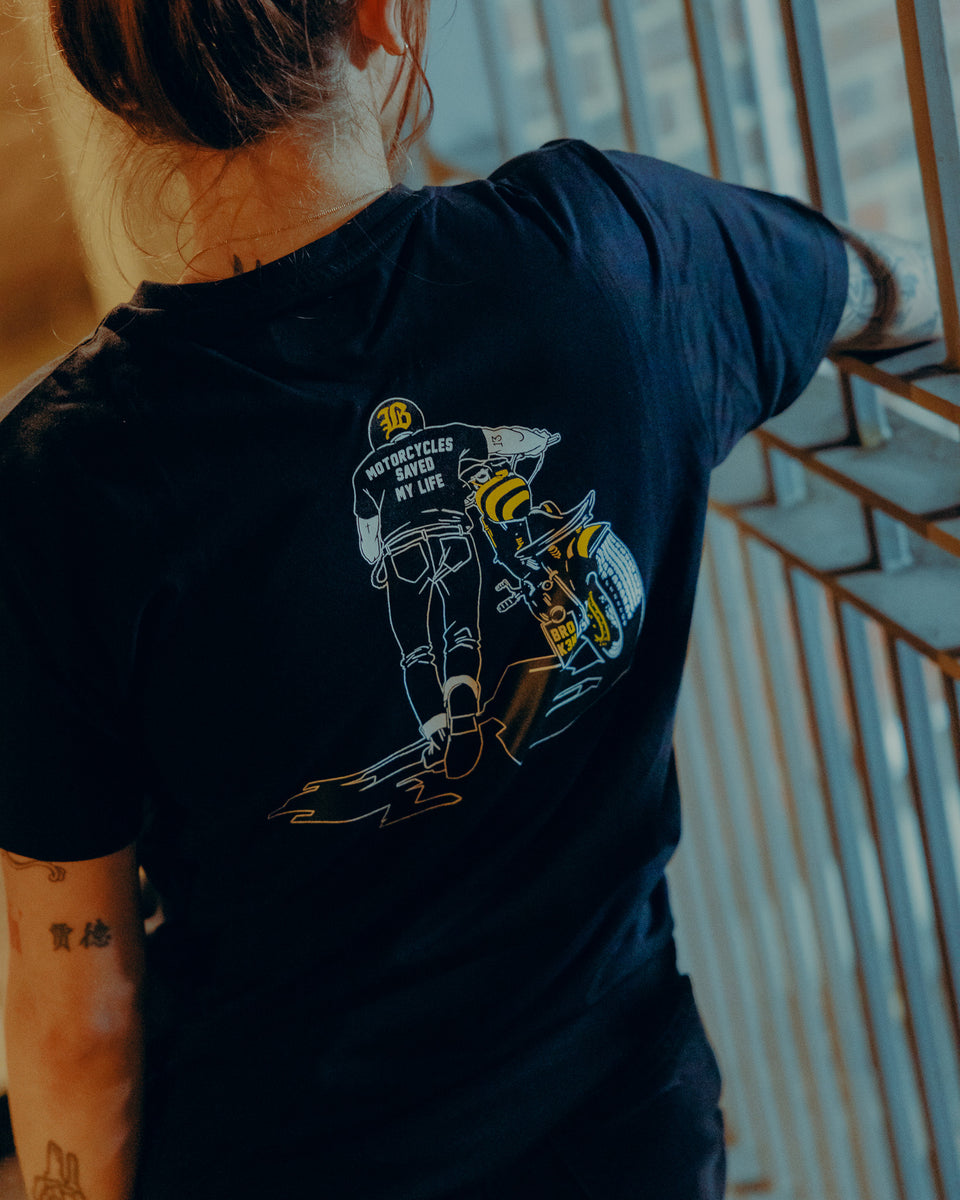 Black T-shirt with a graphic design of a person on a motorcycle back