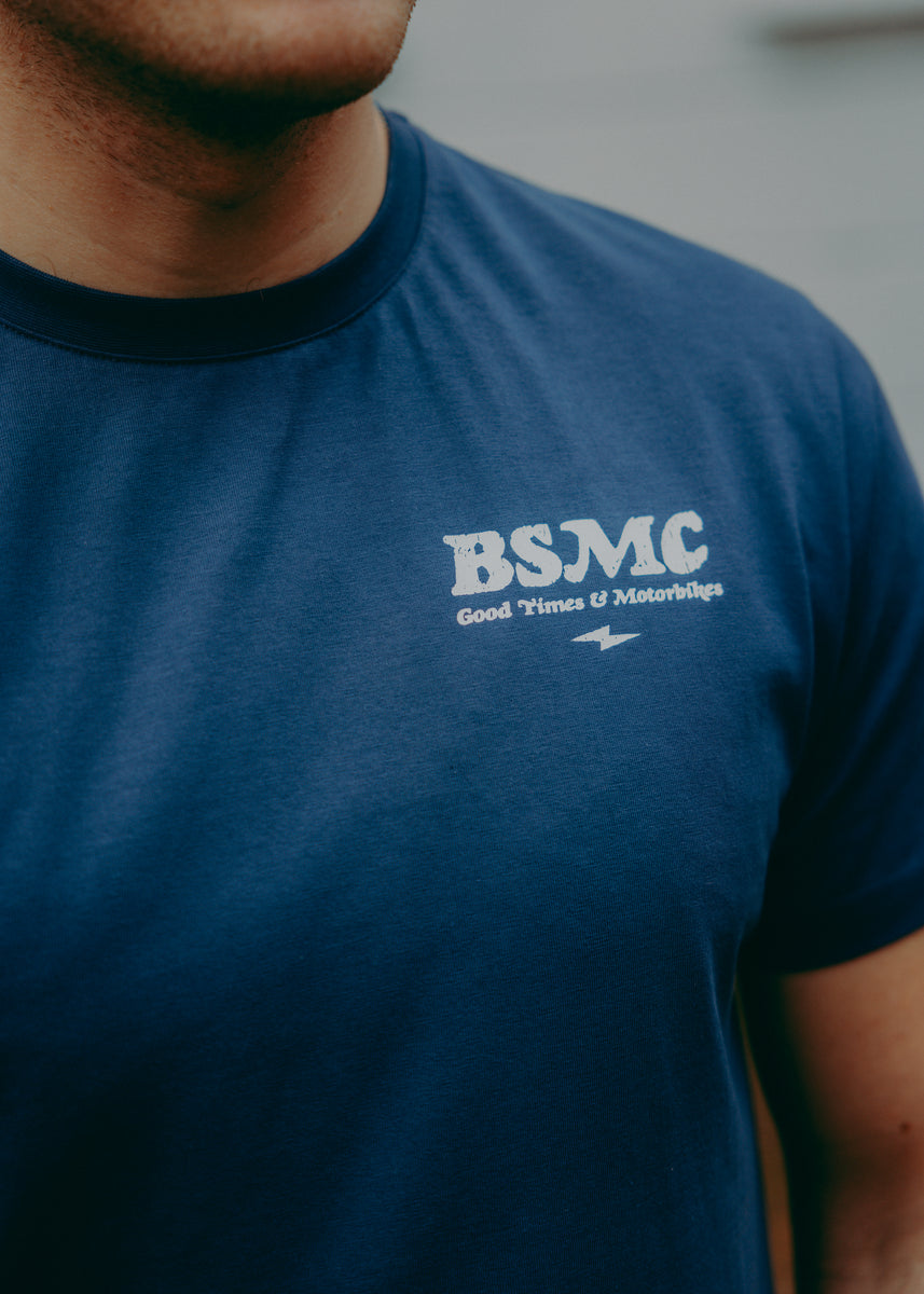 A navy-colored T-shirt with 'BIKE SHED MOTORCYCLE CO.' printed on the front.