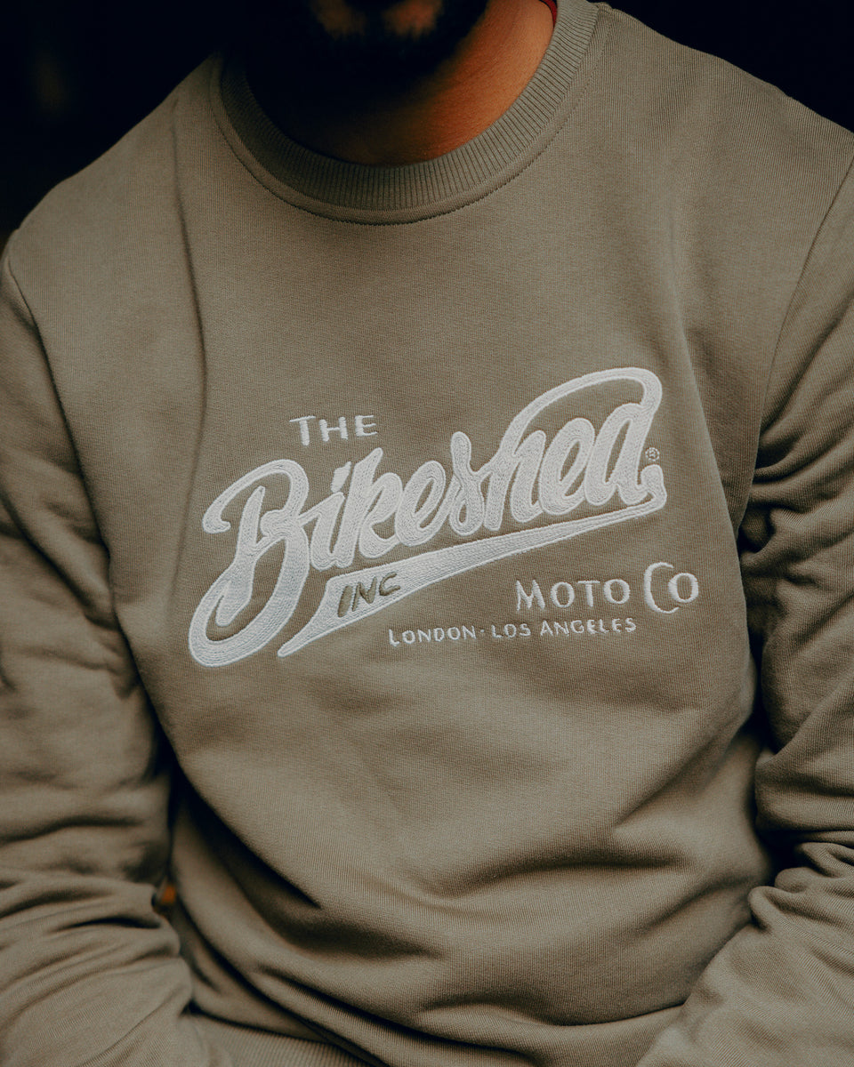 Kyle wearing Inc Applique Sweatshirt Khaki