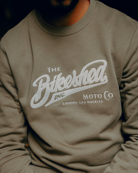 Kyle wearing Inc Applique Sweatshirt Khaki