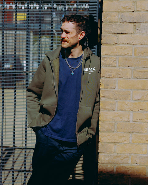Green hoodie with 'Bike Shed Motorcycle Co.' embroidered on the front
