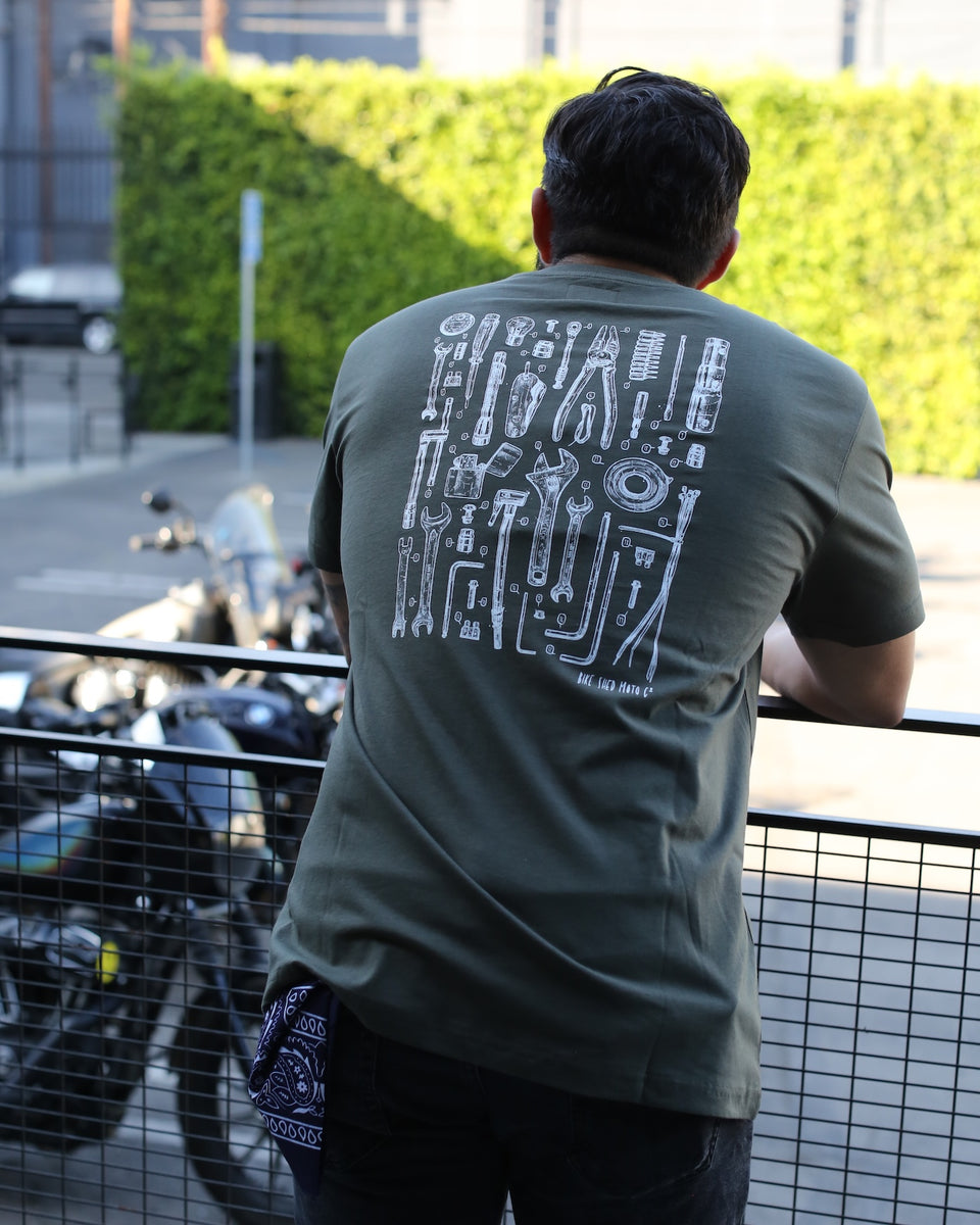 Model wearing our BSMC Motorcycle Toolkit Graphic T-Shirt - Khaki