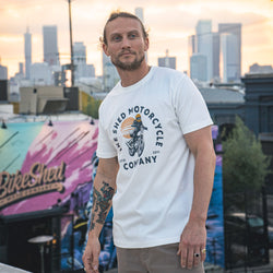 Steve wearing our BSMC Sunset T-Shirt - Off White