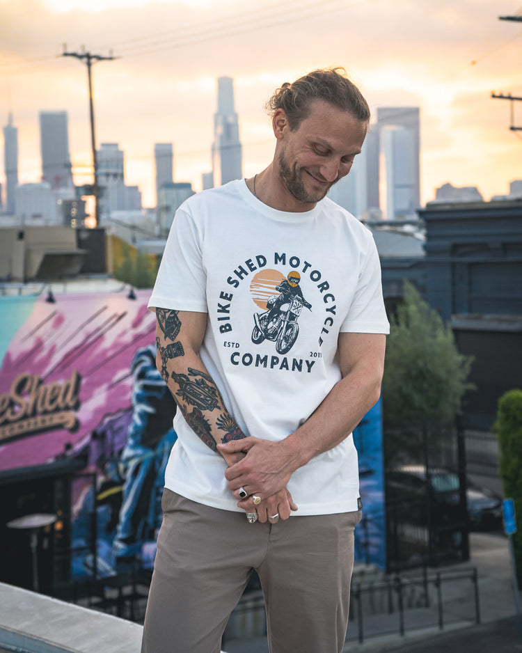 Steve wearing our BSMC Sunset T-Shirt - Off White