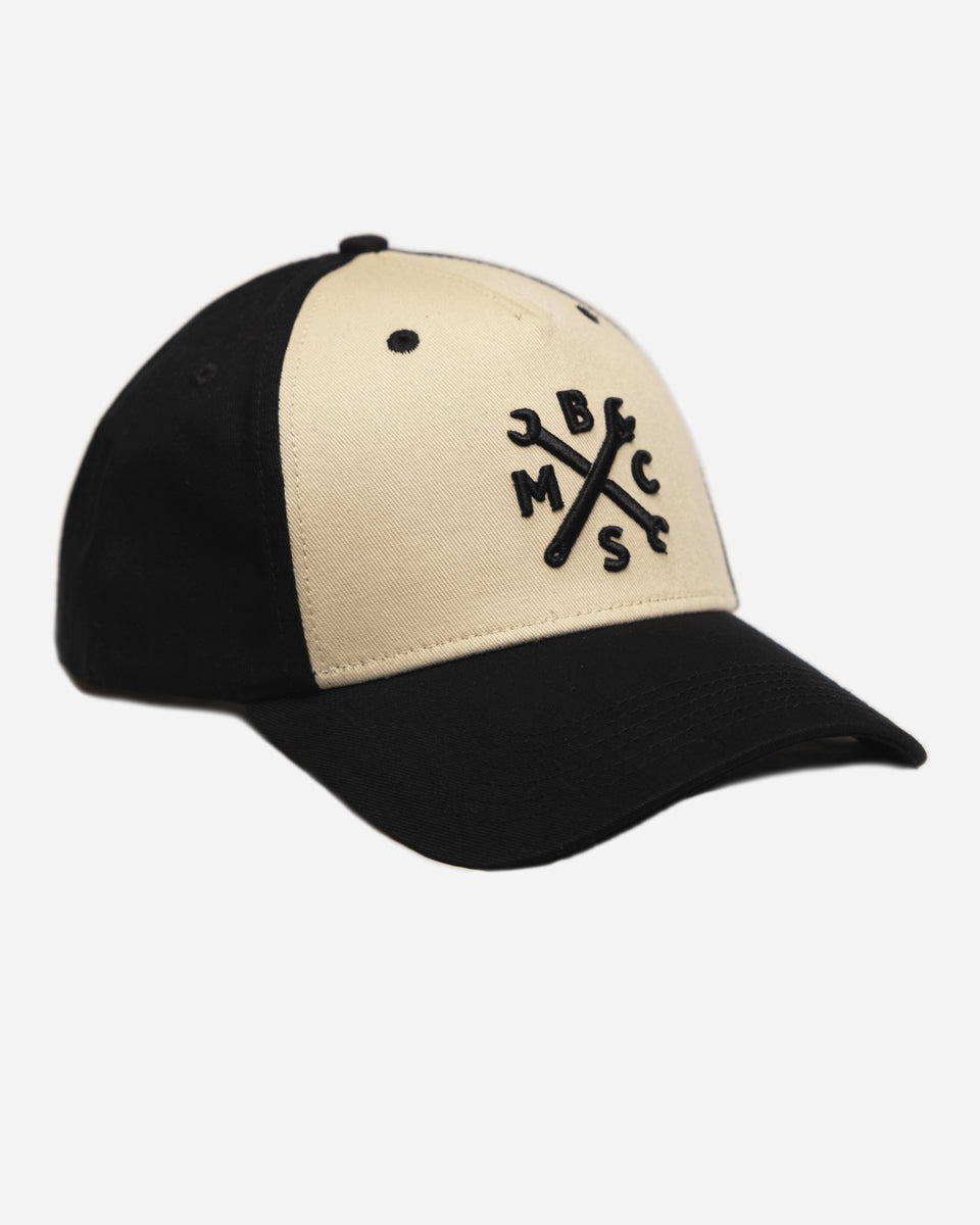 Black and beige Baseball Hat with Bike Shed Moto Co. logo on a white background front
