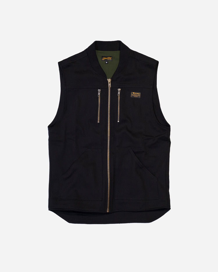 Bike Shed Moto Co Utility Vest Black, Green Lining on a white background.