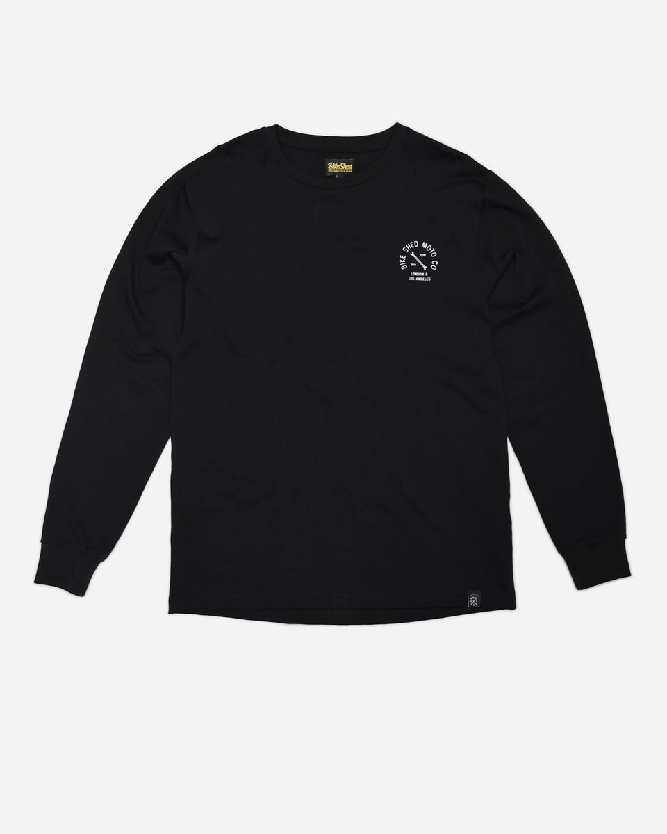 A long sleeve black T-shirt with a round neckline, featuring a front and back print. The front print is a logo, and the back print depicts an illustration of a motorcycle.