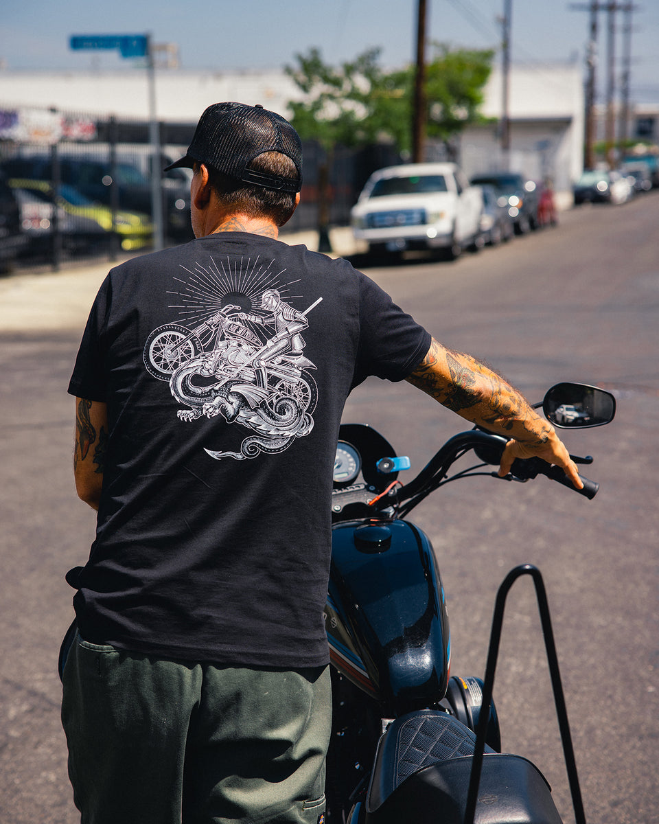 Model pushing his Harley wearing our BSMC Dragon Slayer Motorcycle T-Shirt- Black
