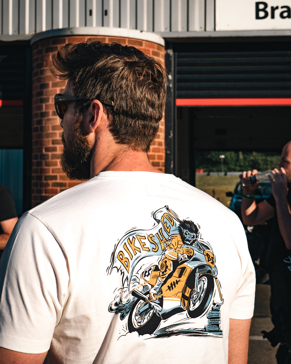 Alen wearing our BSMC Track Wolf Motorcycle Graphic T Shirt - Off White